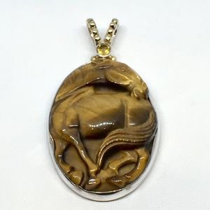 Sterling Silver & Carved Tigers Eye Horse Pendant